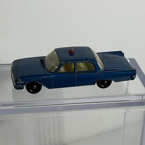Vintage 1963 Lesney Matchbox No. 55b Ford Fairlane police car diecast model.